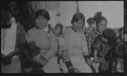 Image of Many Inuit women and children aboard